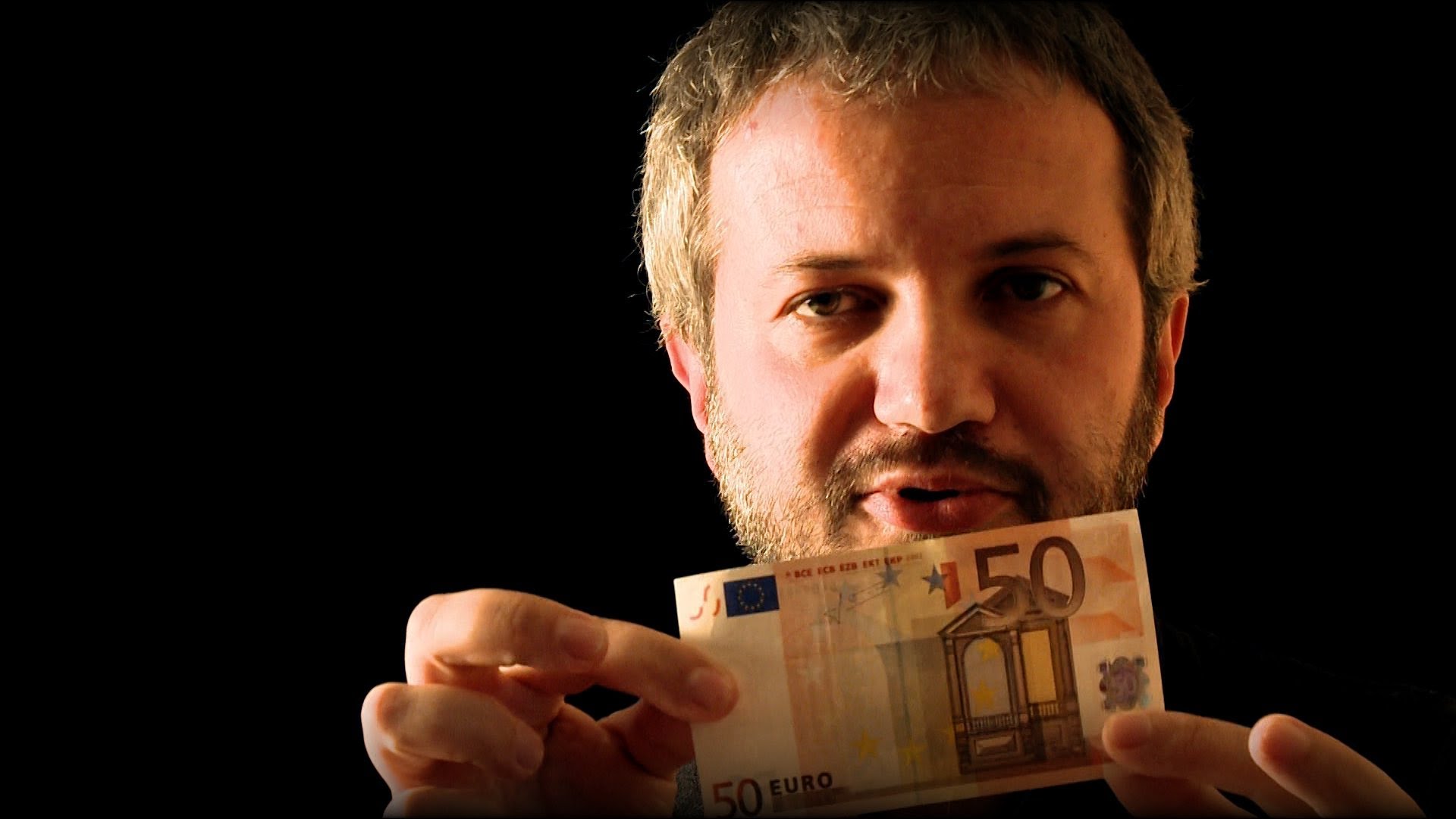 uscire dall'euro, volto di Borghi con una banconota da 50€