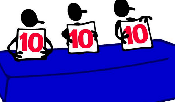 fumetto con tavolo e tre cartelli con scritta rossa del numero dieci