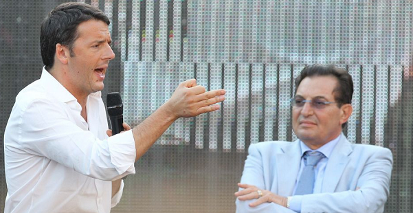 sul palco intervento di renzi in camicia bianca affianco a crocetta in abito e cravatta azzurra