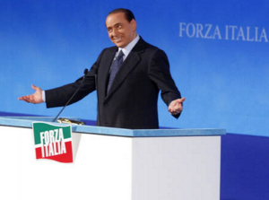 Berlusconi e Forza Italia, M5S, Pd, ballottaggio, Berlusconi in espressione sorniona durante una manifestazione di Forza Italia