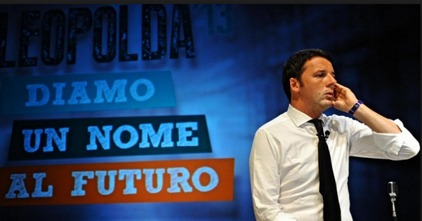 Leopolda, Firenze, Renzi, sul palco della Leopolda quinta edizione il premier renzi al telefono con dietro la scritta leopolda diamo un nome al futuro