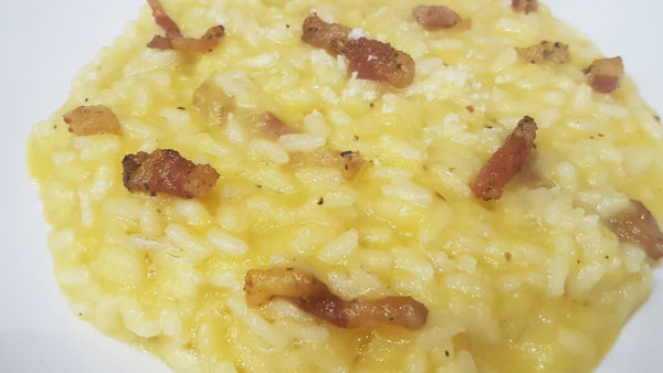 Risotto alla zucca, ricetta facile con pecorino e guanciale, le calorie