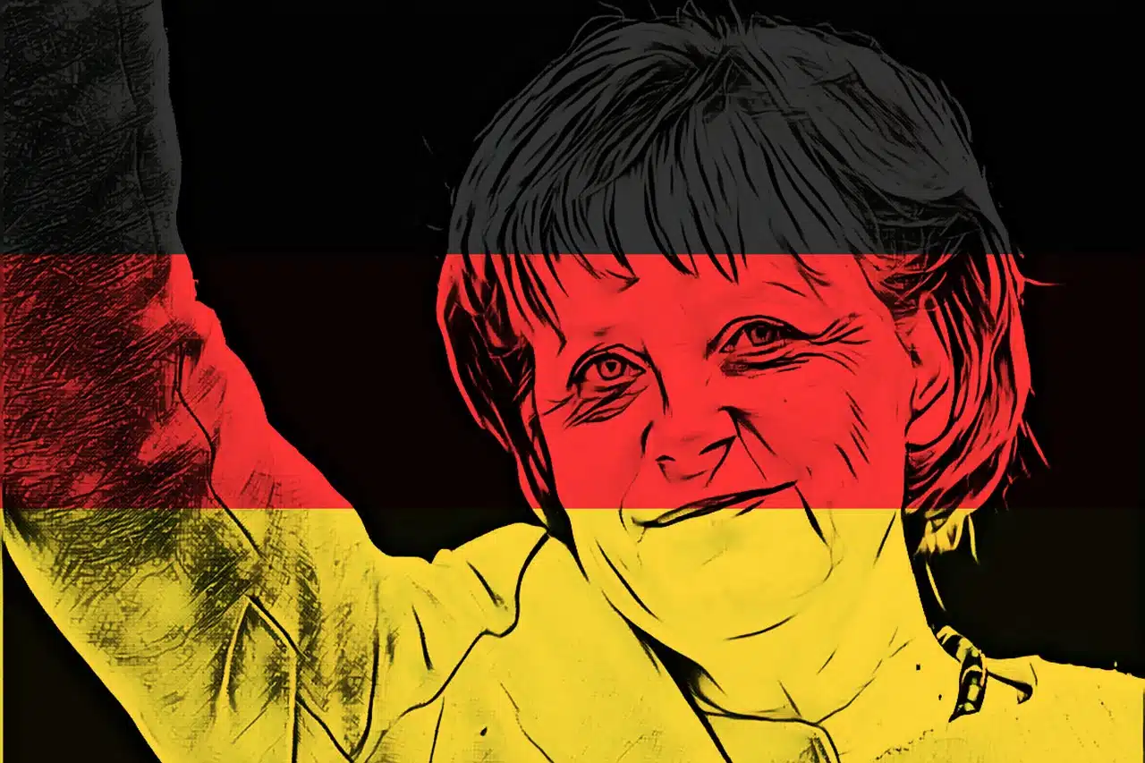 Merkel con sfondo i colori della bandiera tedesca
