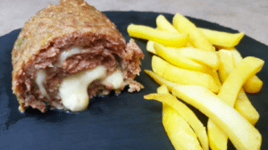 Polpettone al forno con prosciutto cotto e formaggio Polpettone al forno con prosciutto cotto e formaggio