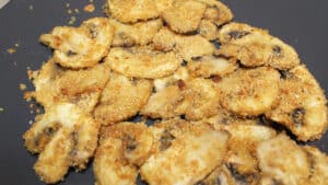 Funghi champignon gratinati al forno Funghi champignon gratinati al forno