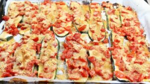Zucchine gratinate al forno con pomodorini Zucchine gratinate al forno con pomodorini