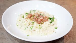 Risotto alla birra con speck e stracchino Risotto alla birra con speck e stracchino
